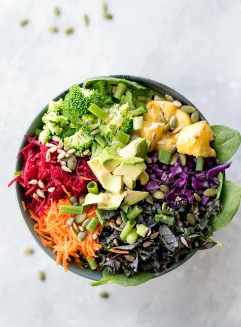 Preparing fresh organic salad
